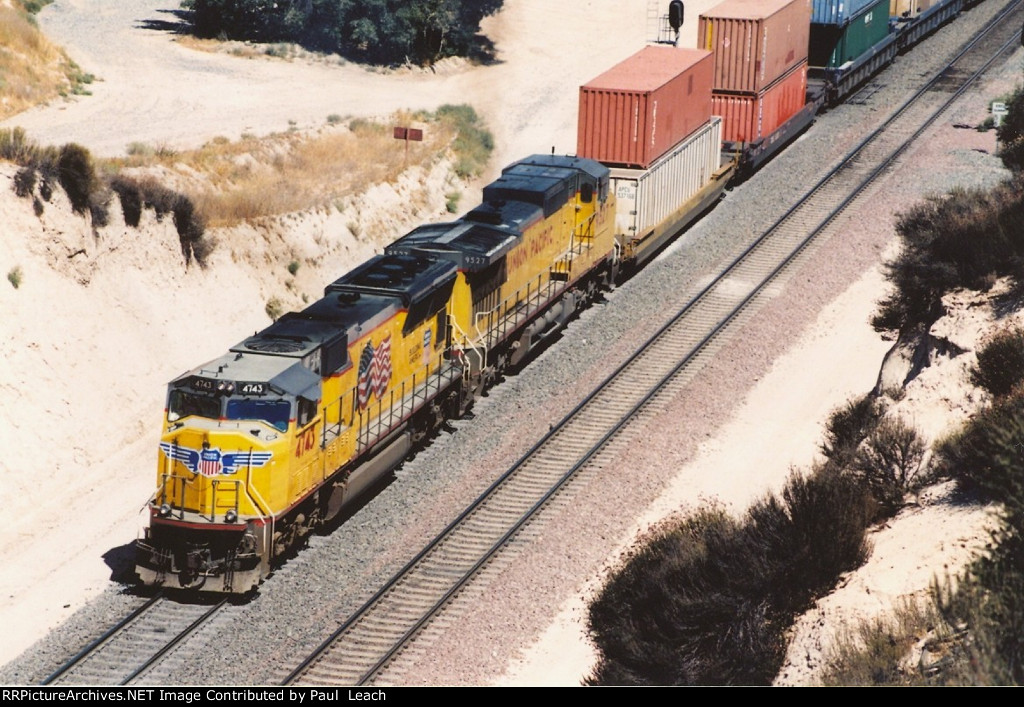 Westbound stack train eases down